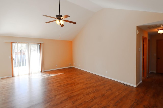 spare room with hardwood / wood-style floors, ceiling fan, and vaulted ceiling