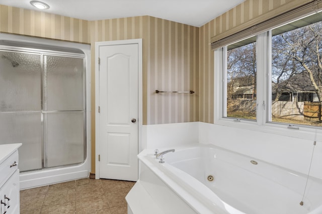 bathroom featuring tile patterned flooring, vanity, and independent shower and bath