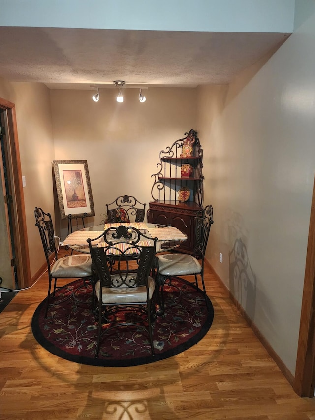 dining room featuring hardwood / wood-style flooring