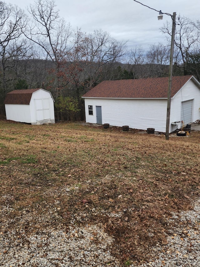 exterior space with a storage shed