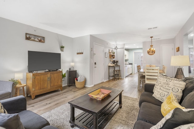 living room featuring light wood-type flooring