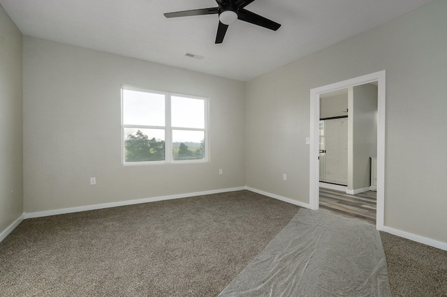 empty room featuring carpet and ceiling fan