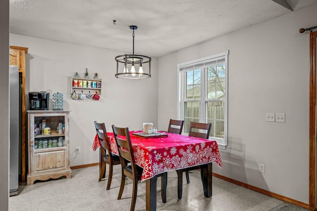 dining room featuring an inviting chandelier