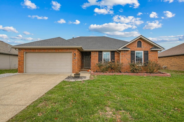 single story home with a garage and a front lawn