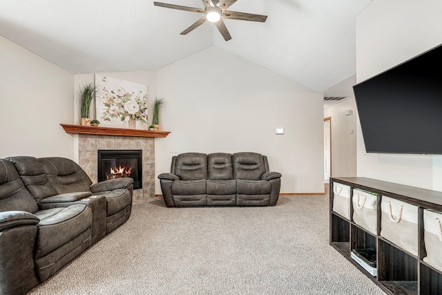 776 S Pinehurst St, Nixa, MO 65714 - living room featuring ceiling fan, a tiled fireplace, carpet flooring, and lofted ceiling