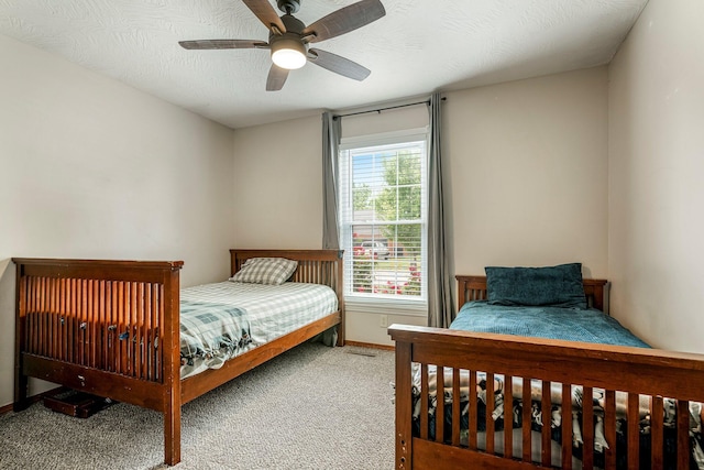 776 S Pinehurst St, Nixa, MO 65714 - carpeted bedroom with a ceiling fan and baseboards