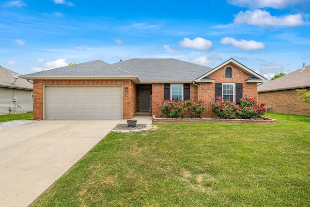 776 S Pinehurst St, Nixa, MO 65714 - view of front of property featuring an attached garage, brick siding, concrete driveway, and a front lawn