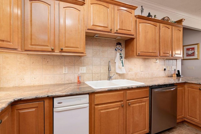 kitchen with dishwasher, sink, decorative backsplash, ornamental molding, and light stone countertops