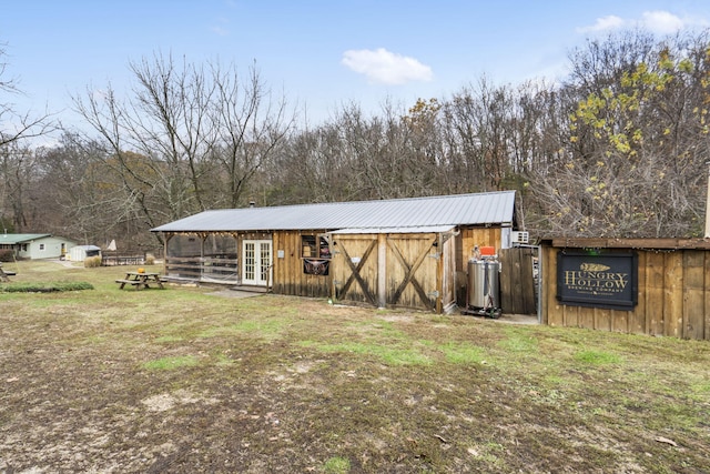 view of outdoor structure featuring french doors