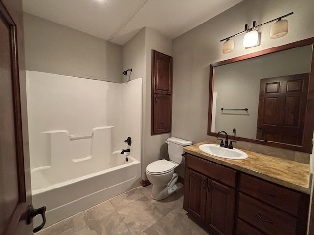 full bathroom with toilet, vanity, and bathing tub / shower combination