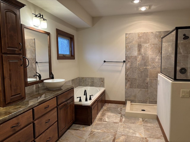 bathroom with vanity and plus walk in shower