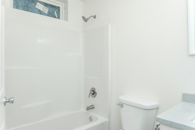 full bathroom featuring vanity, shower / bathing tub combination, and toilet