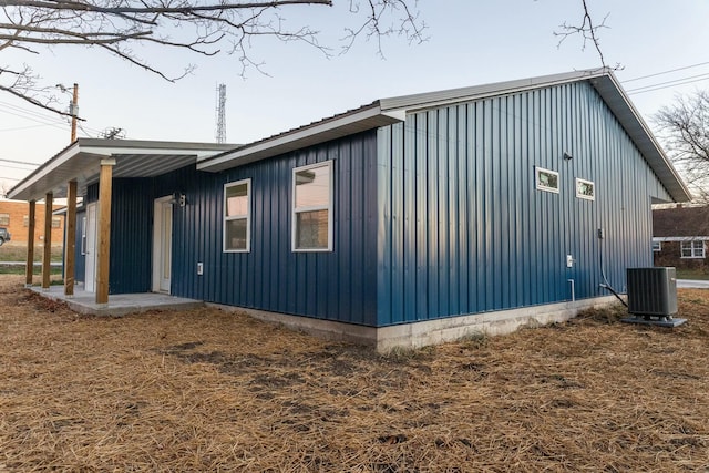 view of side of property featuring cooling unit