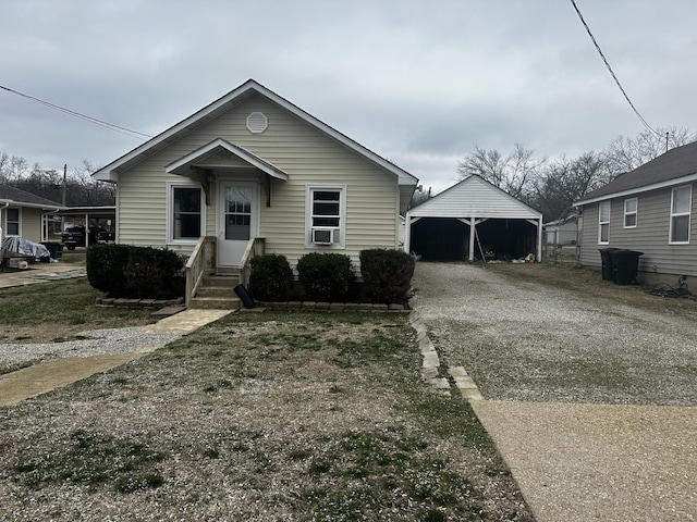 bungalow featuring a carport