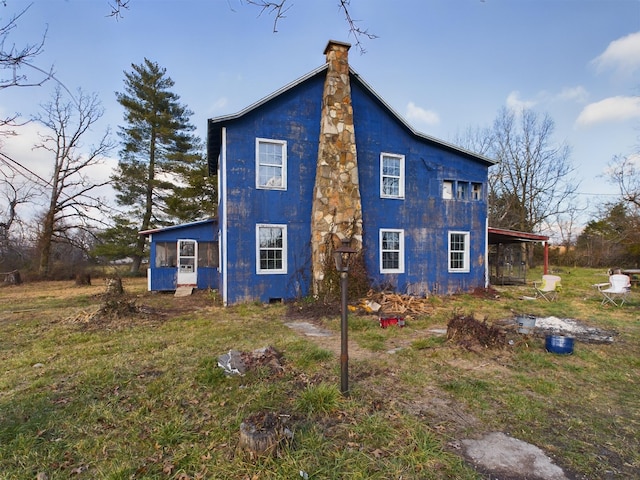 view of property exterior with a lawn