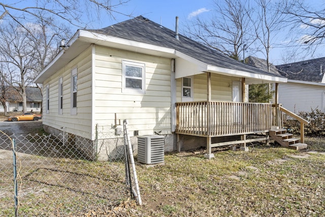 exterior space featuring a deck and central AC unit