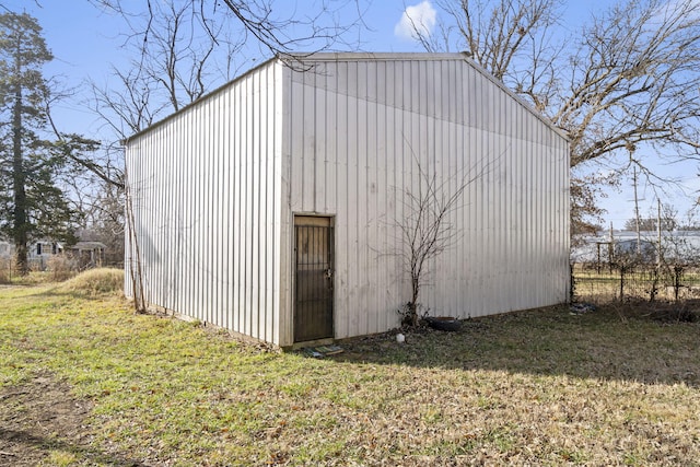 view of outdoor structure with a yard