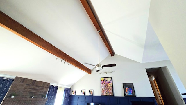 room details with ceiling fan and beam ceiling