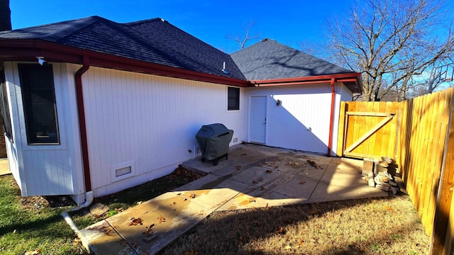 back of house with a patio area