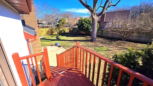 deck featuring a lawn