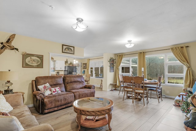 living room with light hardwood / wood-style floors