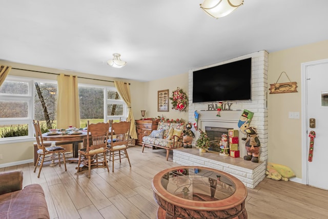 living room with light hardwood / wood-style flooring