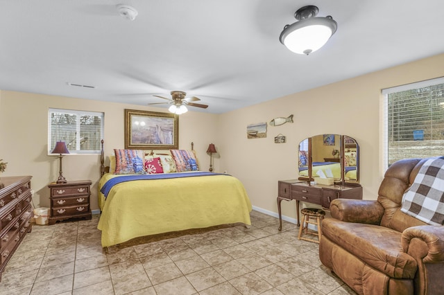 bedroom featuring ceiling fan and light tile patterned floors