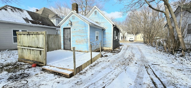 view of snow covered property