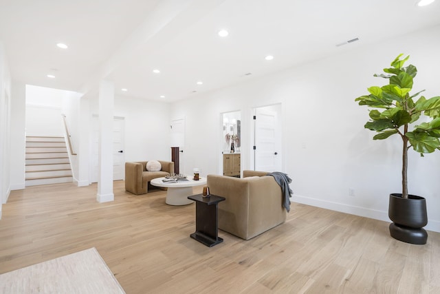 living room with light hardwood / wood-style floors