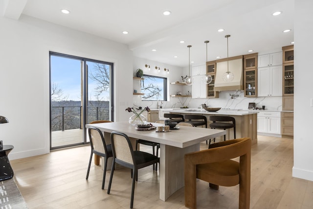 dining room with light hardwood / wood-style floors