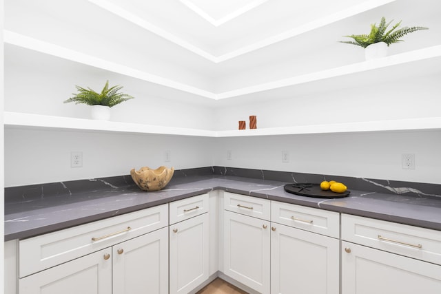 kitchen featuring white cabinetry