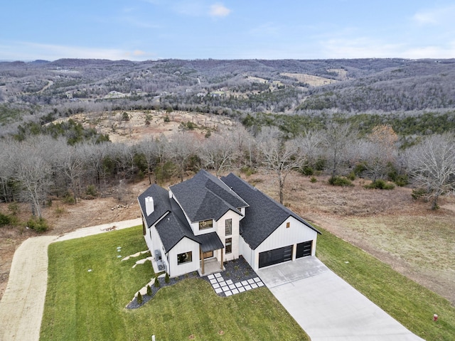 bird's eye view with a mountain view