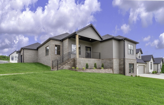 702 S Thornridge Dr, Springfield, MO 65809 - view of front of house featuring brick siding, concrete driveway, a front yard, and a shingled roof
