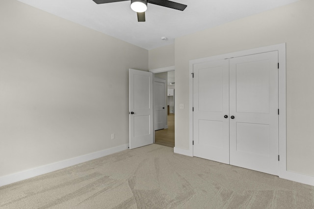702 S Thornridge Dr, Springfield, MO 65809 - unfurnished bedroom with light carpet, baseboards, a closet, and ceiling fan