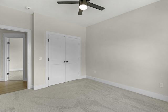 702 S Thornridge Dr, Springfield, MO 65809 - unfurnished bedroom featuring carpet floors, baseboards, a closet, and ceiling fan