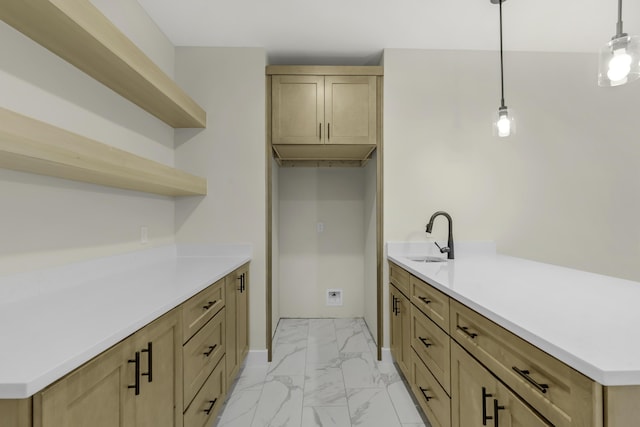 702 S Thornridge Dr, Springfield, MO 65809 - kitchen with open shelves, a sink, light marble finish flooring, pendant lighting, and a peninsula