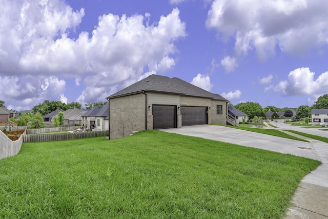 702 S Thornridge Dr, Springfield, MO 65809 - view of home's exterior featuring brick siding, concrete driveway, a garage, a residential view, and a shingled roof