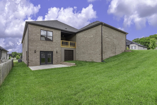 702 S Thornridge Dr, Springfield, MO 65809 - back of property featuring brick siding, french doors, a patio area, a balcony, and central air condition unit