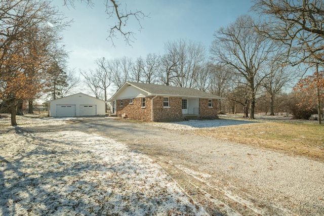 view of property exterior with an outbuilding and a garage