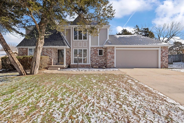 view of front facade featuring a garage and a front yard