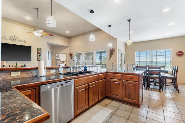 kitchen featuring kitchen peninsula, stainless steel dishwasher, ceiling fan, sink, and light tile patterned flooring