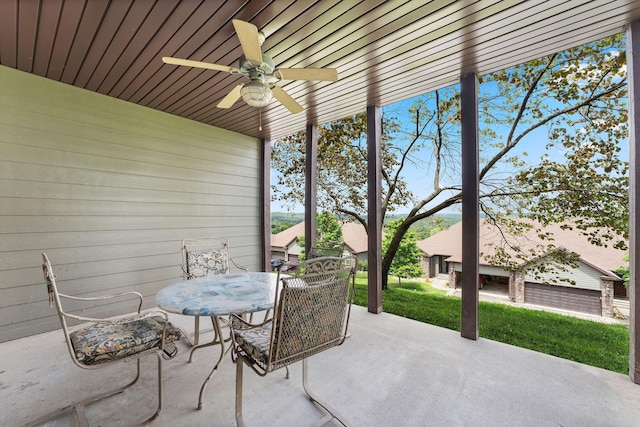 view of patio featuring ceiling fan