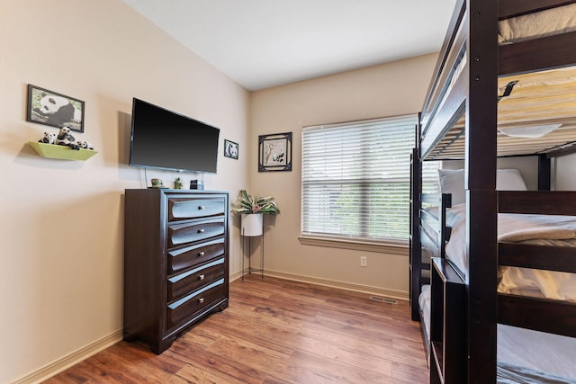 bedroom featuring hardwood / wood-style flooring