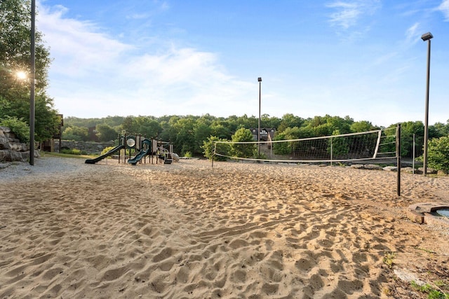 view of property's community featuring volleyball court