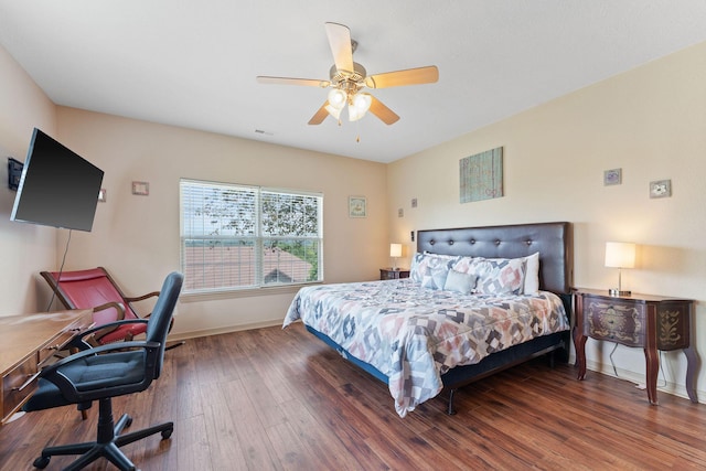 bedroom featuring wood-type flooring and ceiling fan