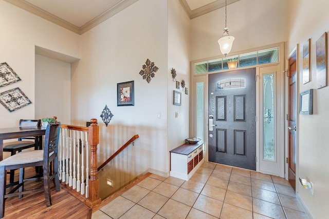 tiled entryway with ornamental molding