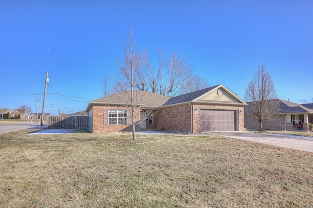 single story home featuring a front yard and a garage