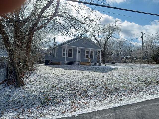 bungalow-style home with a porch