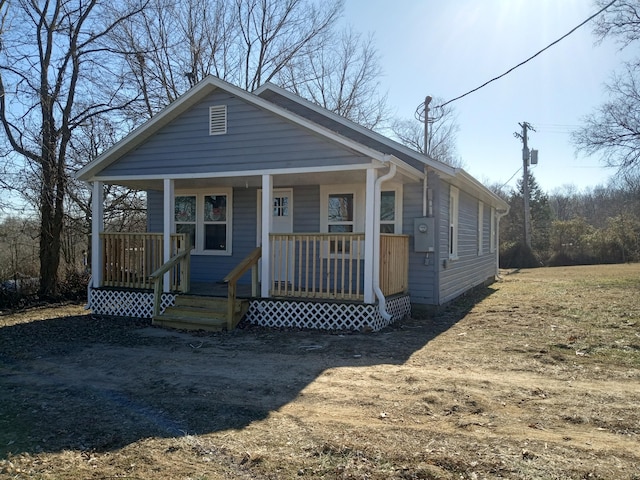 bungalow-style home with a porch