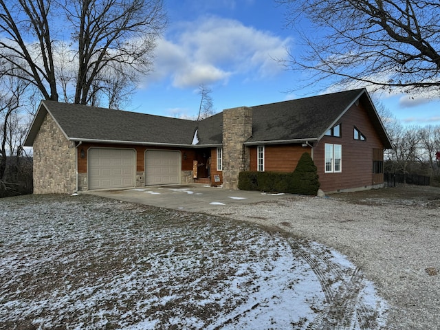 ranch-style home with a garage